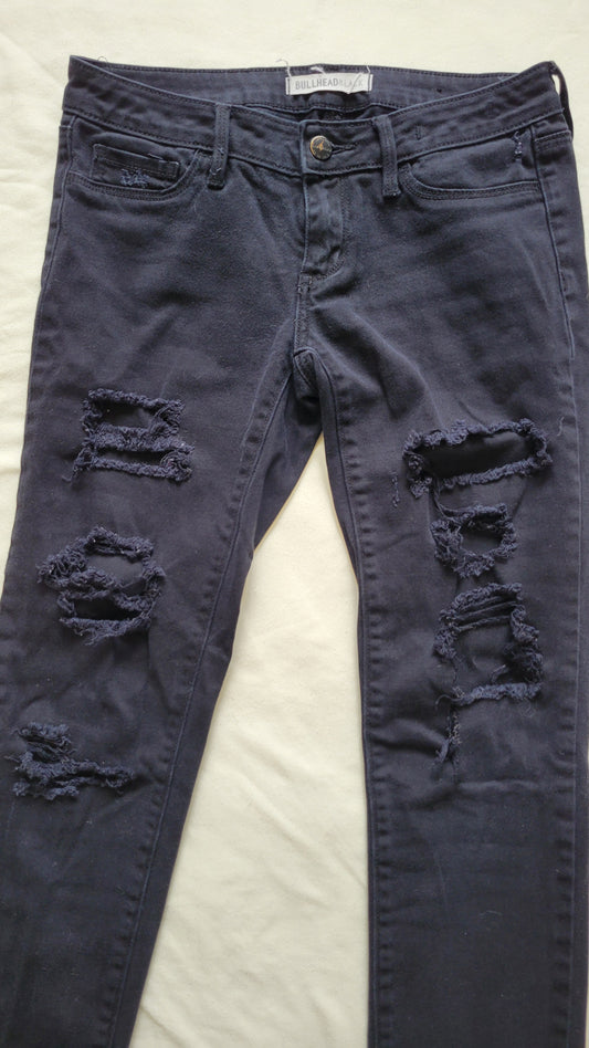 Ripped black skinny jeans